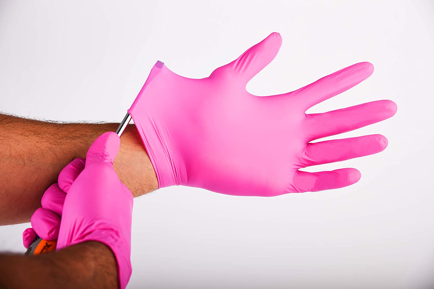 Pink nitrile glove.jpg